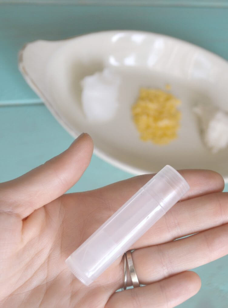 DIY lip balm recipe for making all natural chap stick at home. Tutorial uses oil, shea butter, beeswax, & essential oils. Great gift or stocking stuffer!