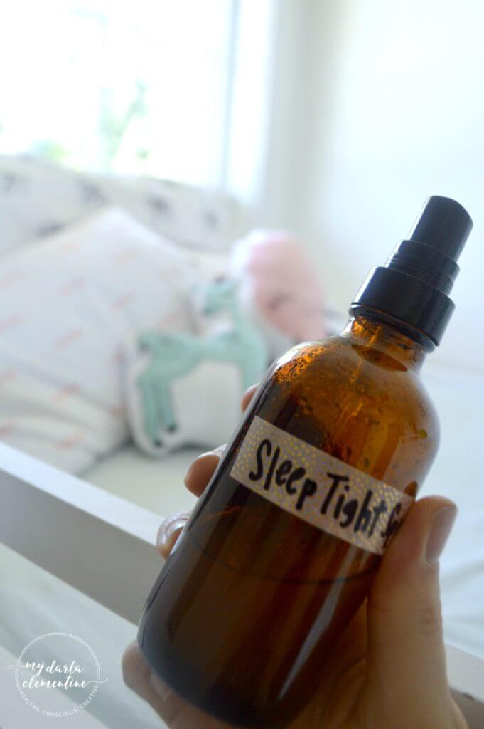 This DIY "Sleep Tight" natural pillow spray uses calming essential oils and natural ingredients to improve sleep quality & promote feelings of calm, rest, and relaxation. Also includes tips on which essential oils are safe for kids, and which essential oils are best for relaxation and stress relief.
